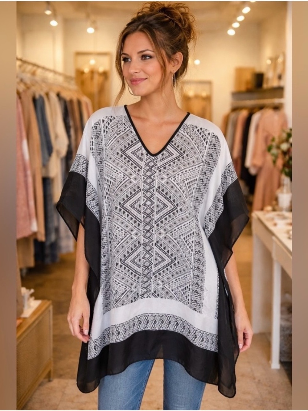 Michael Kors
Elegant top with black and white geometric.  EUC